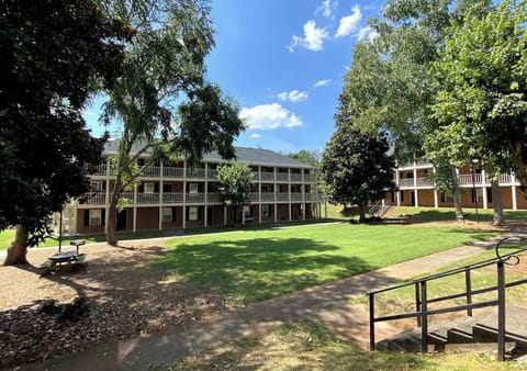 Shared courtyard with picnic tables and charcoal grills for your use. 