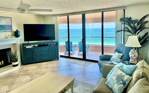 Living room with huge sectional, Lazy-Boy, fireplace and Smart TV, with cable