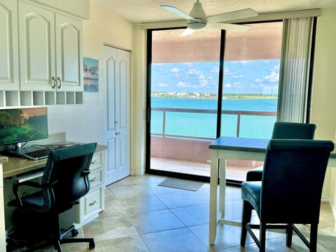 Breakfast nook and computer desk at back of kitchen. Intercoastal view.