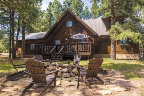 The back porch and fire pit in summer - just imagine how beautiful when then snow starts falling