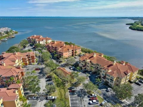 Aerial view of  complex with water views 