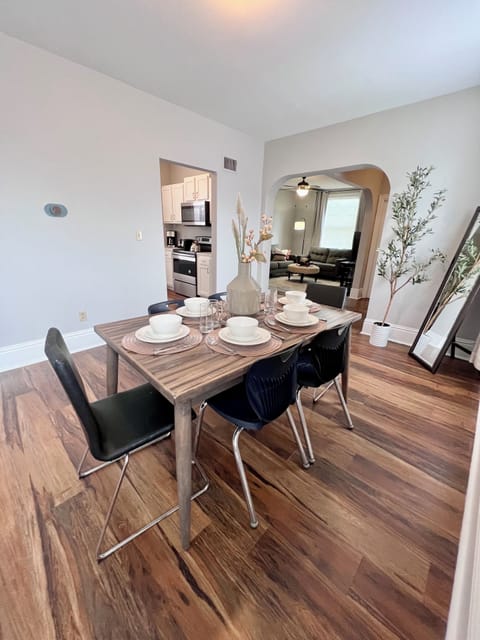 Spacious dining area with full stocked kitchen to make home cooked meals.