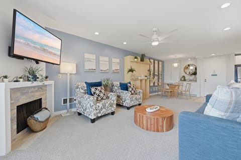 A perfect spot to unwind, featuring cozy seating and plenty of space for the whole family to relax after a day at the beach.