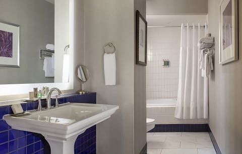 Refresh at a sleek vanity with bright, flattering mirror light.