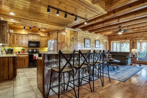 Enjoy culinary adventures in this charming wood-accented kitchen with stylish decor!