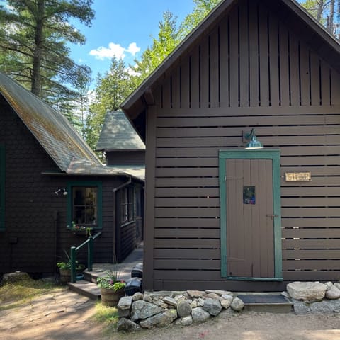 Workshop exterior with dining room building to the left