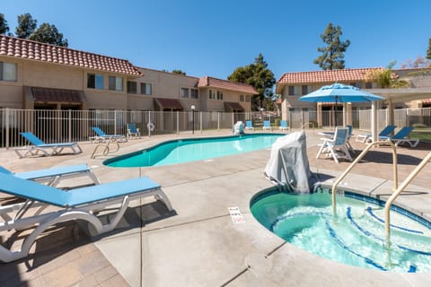 Dive into sunny pool days with soothing spa bubbles.