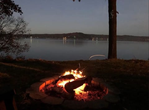 Fire pit view of the Lake at night