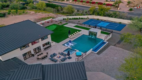 Resort-style backyard: pool, spa, sport court & putting green