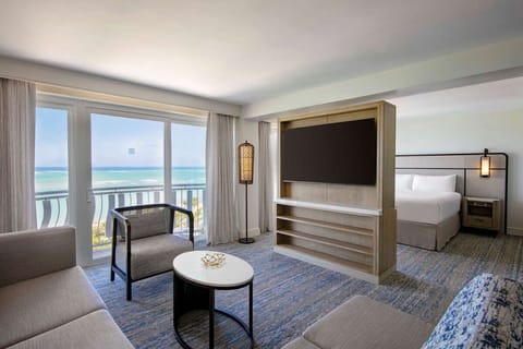 Stretch out in the airy suite with balcony and lounge.