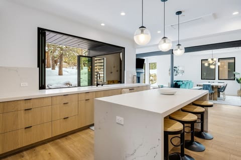 Accordion window opens to large back deck
