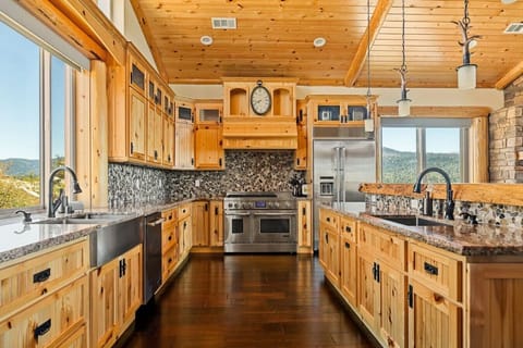 Features of the kitchen include, a microwave, dishwasher, Keurig coffee maker, Expresso machine and a drip coffee maker.