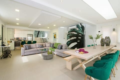 Expansive Common Area Integrating Living, Dining, and Kitchen Spaces