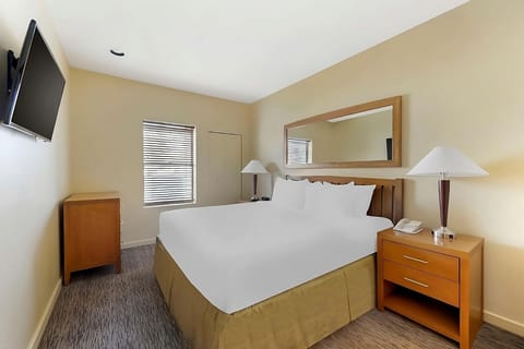 Unwind in crisp king bedding with easy in-room entertainment.