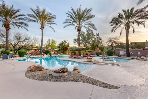 Stretch out poolside on spacious decks beneath soaring palms.