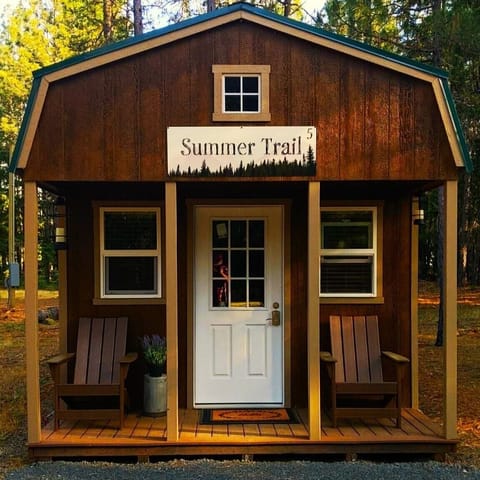This cozy cabin, nestled among the towering pines and firs,  offers a rustic charm and a serene retreat from the hustle and bustle of everyday life. The place features a luxury king-sized bed with cozy blankets, Smart TV, a Keurig Coffee maker, Mini-fridge, a microwave, air conditioning, and heat. 