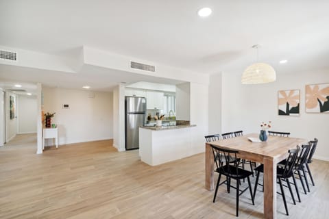 View of the kitchen and dining from the back door.
