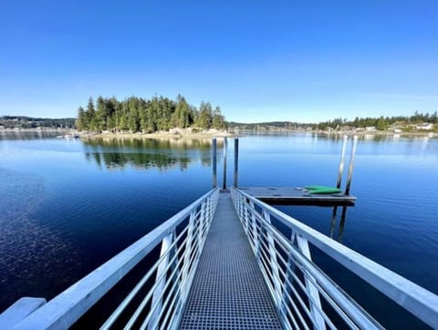 Private dock for kayaking, fishing, and relaxing with stunning canal views.