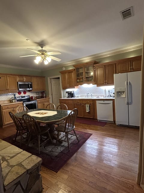 Fully stocked kitchen, complete with Kitchen-aid mixer and waffle iron.
