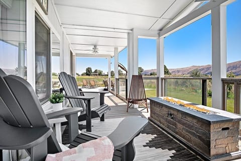 On the green with stunning mountain views.