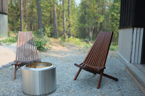 Smokeless campfire stove for evening relaxation and storytelling.