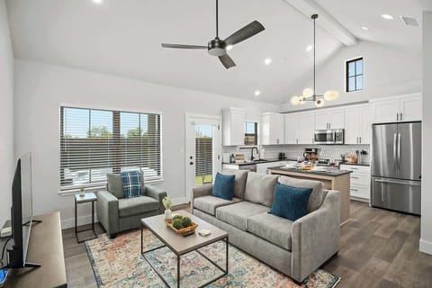 Sink into the comfy couch in the spacious living room.