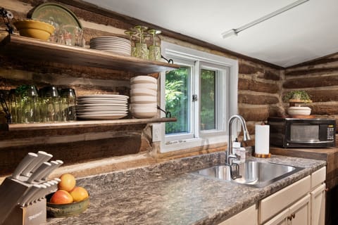 Charming kitchen combines rustic charm with modern ease. 