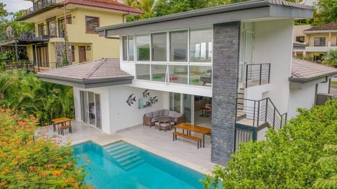 Casa Zen is a modern home with main floor living space plus a second floor yoga/fitness space with futon and smart TV.  