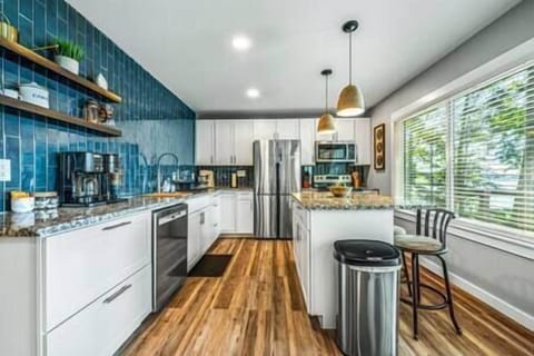 Full kitchen. Breakfast bar for additional seating for three.