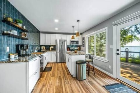 Enjoy big lake views while cooking in our fully stocked kitchen.