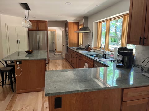 Kitchen with all new appliances, counters, island