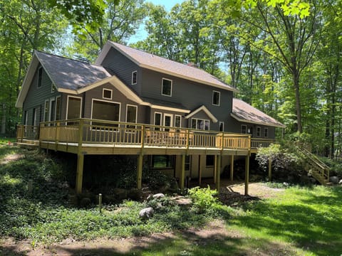 Rear view of house, back deck