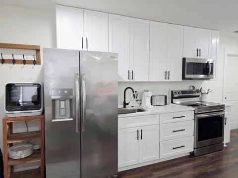Full kitchen with oven that doubles as an air fryer