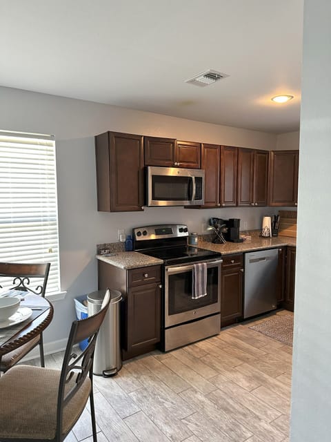 Kit has pots,pans,roasting pans,serving bowls,dishware,glassware,plastic cups