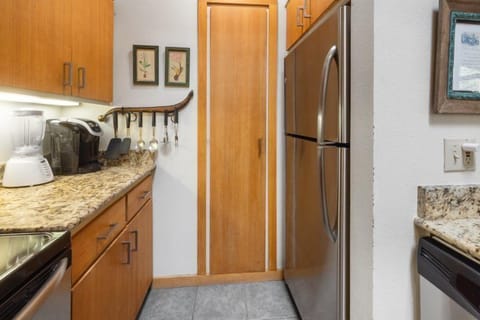 Modern convenience meets mountain charm in this well-equipped kitchen, designed for culinary adventures no matter the season.