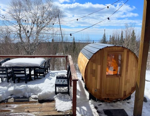 8 ft barrel sauna with winter views of Lake Superior, sits 6-8 people