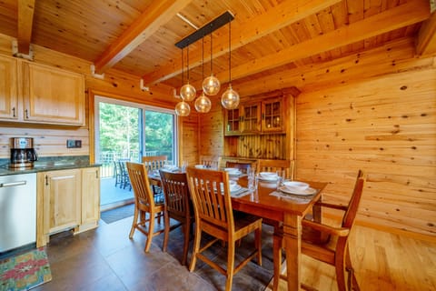 There's plenty of room to cook, gather, and dine in the beautiful open-plan kitchen - dining room