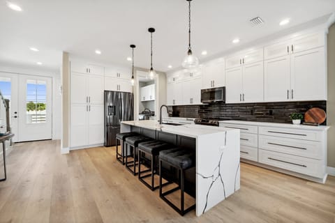 Fully equipped kitchen with stainless appliances and ample prep space on the 2nd floor