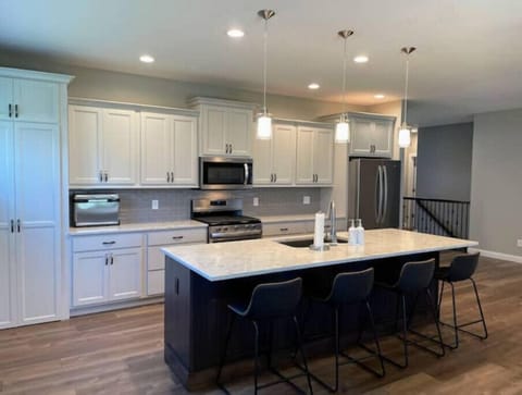 Kitchen with a walk-in pantry.