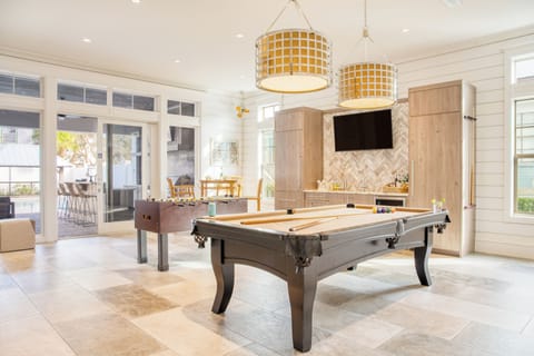 Pool or foosball? We've got an arcade table game too!