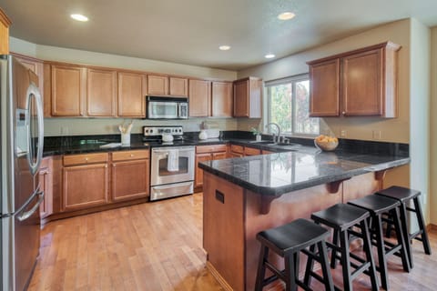 Barstool seating at the kitchen.