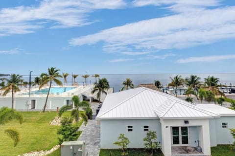 Upstairs Balcony View of the Atlantic Ocean, Large Pool, Clubhouse- great location and short walk to the community amenities!