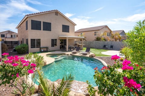 Welcome to paradise!  Beautiful yard with sparkling heated pool!