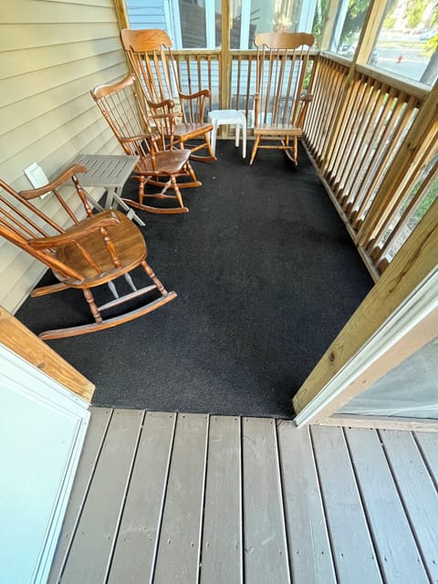 Screened front porch with seating