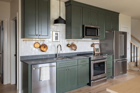 The lower-level kitchen is fully equipped.