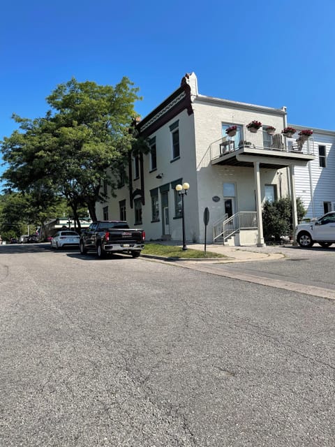 Studio entrance on waterfront drive Simms sign to left of the door