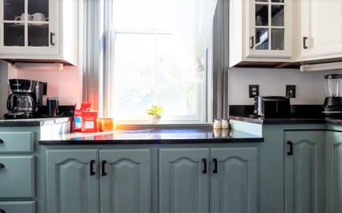 Coffee and tea station, with pleasant view of back yard.