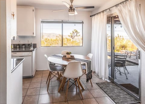 Dining area and door to covered patio. 