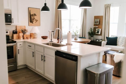 The kitchen features stainless steel appliances and all the tools you need to make a delicious meal during your stay. 