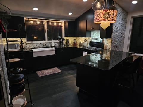 Kitchen lights up beautifully at night.